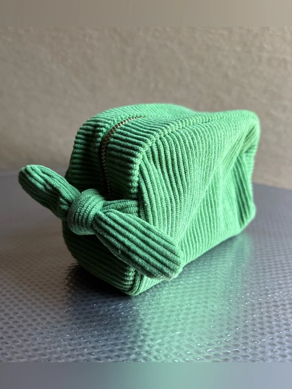 Tata Harper small green corduroy makeup bag